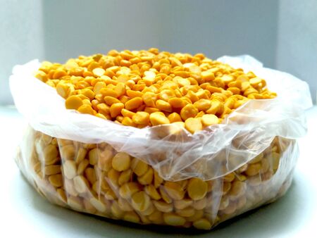 Split Chickpea Also Know as Chana Dal, Yellow Chana Split Peas, Dried Chickpea Lentils or Toor Dal isolated on white Backgroundの写真素材