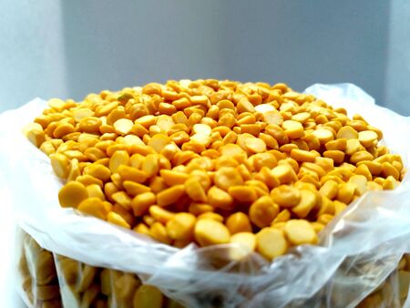 Split Chickpea Also Know as Chana Dal, Yellow Chana Split Peas, Dried Chickpea Lentils or Toor Dal isolated on white Backgroundの写真素材