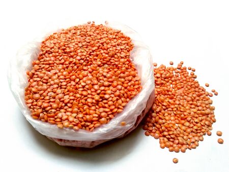Red Lentils or Masoor Dal isolated on White Backgroundの写真素材