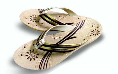 ladies flat slippers isolated on white backgroundの写真素材