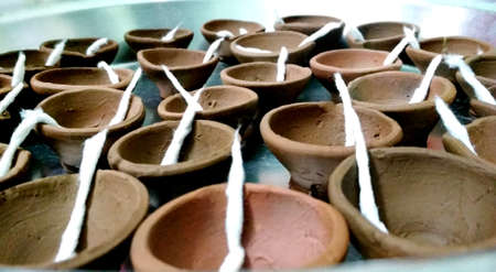 A diya and bati in diwali festivalの写真素材