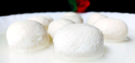 An indian Sweet Rasgulla Also Know as Rosogolla, Roshogolla, Rasagola, Ras Gulla is a Syrupy Dessert Popular in India.の写真素材
