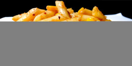 Closup of penne pasta with tomato sauceの写真素材