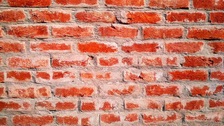 Texture of old dark brown and red brick wall backgroundの写真素材