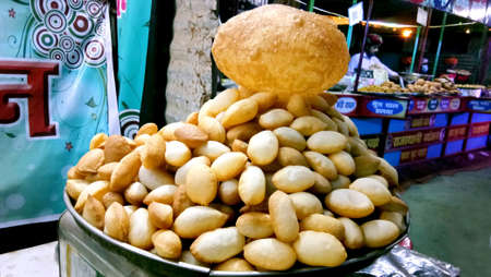 Lucknow, uttar pradesh - january 2021 : Paani Poori is an Indian street food snack that nobody can resist.のeditorial素材