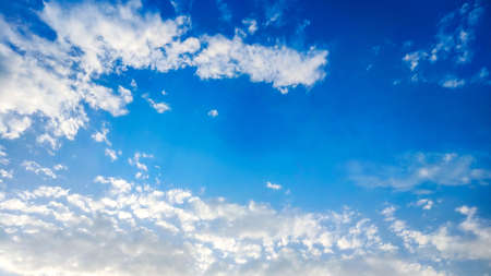 blue sky background with tiny cloudsの写真素材