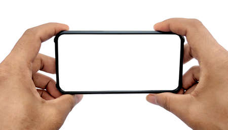 A man holding smartphone with blank screen on white background, closeup of hand. Space for text