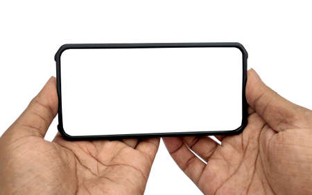 A man holding smartphone with blank screen on white background, closeup of hand. Space for text