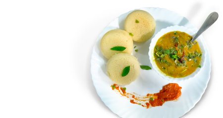 South indian breakfast idli, sambar and coconut chutney isolated on white backgroundの写真素材
