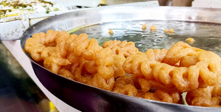 An Indian Sweet Imarti at Shop, A circular shaped dessert