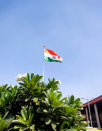An Indian flag waving outside New Delhi Railway Station