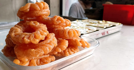 An Indian Sweet Imarti at Shop, A circular shaped dessert