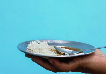 Homemade Healthy nutritious Indian comfort food Dal Chawal or Dal Rice in a plateの写真素材