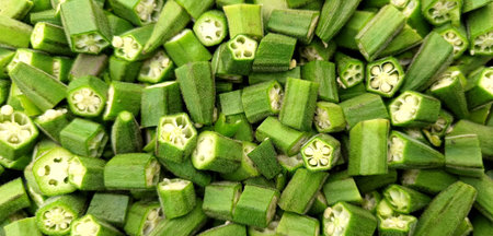 Freshly chopped okra, ladyfinger or bhindi in a stainless steel plate. Ideal for use in cooking...