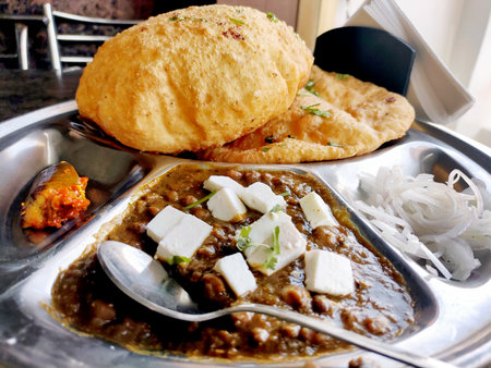 Chole bhature is a North Indian famous food dish. A combination of chana masala and bhatura or puri...