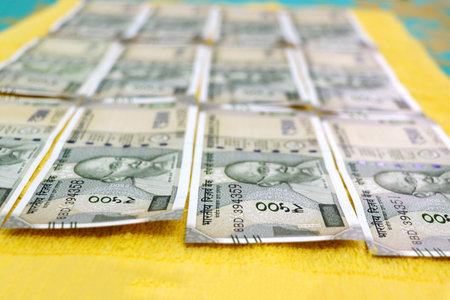 A closup of fanned out spread out Indian Rupees currency paper notes