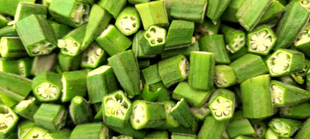 Freshly chopped okra, ladyfinger or bhindi in a stainless steel plate. Ideal for use in cooking...