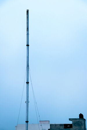 A vertical chimney pipe, designed to release smoke into the sky