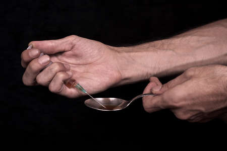 Drug use. Spoon Syringe and Heroin の写真素材