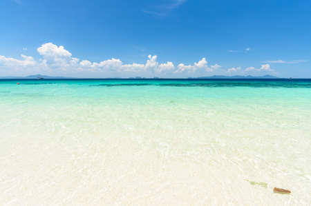 Unbelievably clear, clean water with hundreds of shades of blues and greens and white sugar sand beachesの写真素材