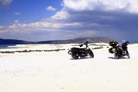 motorcycles at the shore near the lakeの写真素材