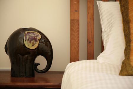 A luxury bedroom with elephant decorationの写真素材