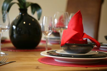 a neatly folded napkin at an elegant dining tableの写真素材