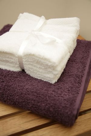 twol towels on white on purpleの写真素材