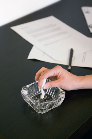 Smoking has been banned in the workplace in the UK and many other countriesの写真素材