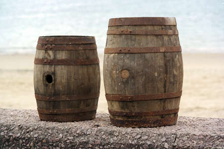 Two old wooden barrels for distilled beverage at a flea market in Brittany, Franceの写真素材
