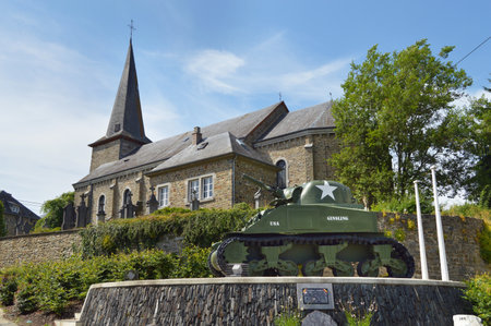 WIBRIN, BELGIUM - JULY 2013:  American Type M4A3 Sherman tank remains as a WWII war memorial located along the main road through Wibrinのeditorial素材