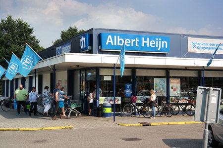THE NETHERLANDS - AUGUST 2015: Albert Heijn Supermarket. Albert Heijn is the biggest Dutch supermarket chain in The Netherlands owned by Koninklijke Ahold NV, a Dutch international retailer.のeditorial素材