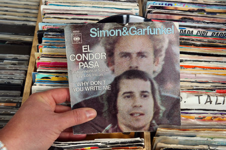 THE NETHERLANDS - APRIL 2016: Single Record of the American folk rock duo Consisting of singer-songwriter Paul Simon and singer Art Garfunkel, in a second hand store.のeditorial素材