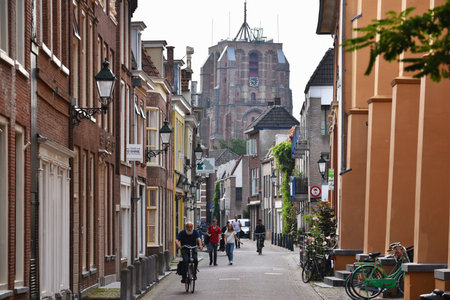 LEEUWARDEN, THE NETHERLANDS - JULY 2016: Street view with in the background, the Oldehove, an unfinished church tower in the center of the Dutch city of Leeuwarden.のeditorial素材