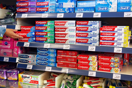 THE NETHERLANDS - JULY 2016: Colgate Toothpaste in a Action Superstore.のeditorial素材
