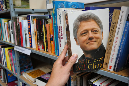 THE NETHERLANDS - JULY 2016: My Life is a 2004 autobiography written by former President of the United States Bill Clinton, in a Dutch second hand store.のeditorial素材