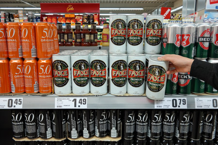 GERMANY - MAY 2017: 1000 ml. Faxe Premium stock cans in a REWE supermarket. Faxe Bryggeri A / S is a Danish Brewery located in the town of Faxe.のeditorial素材