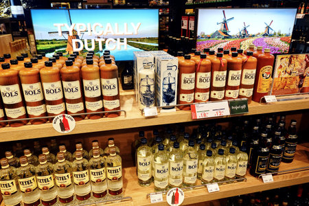 EINDHOVEN, THE NETHERLANDS - NOVEMBER 2019: Jars and bottles of Dutch jenever, the juniper-flavored traditional liquor in the Netherlands.のeditorial素材