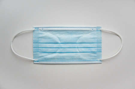 Medical mask isolated on background. Close-up of virus   protective face mask. Workwear prevents...