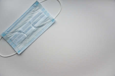 Medical mask isolated on background. Close-up of virus   protective face mask. Workwear prevents...