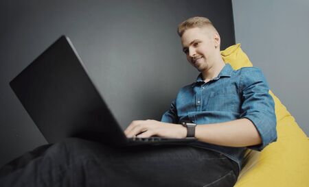 Young man working on laptop