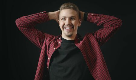 Excited man with hands up