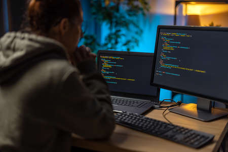 Programist working on computersの写真素材