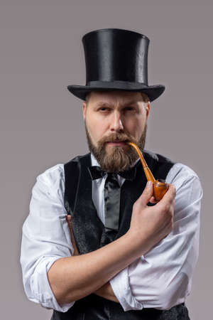 Arictorat in top hat smoking pipeの写真素材
