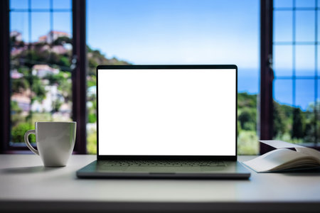 Blank screen laptop on desk