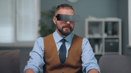 A man is watching holographic screens.の写真素材