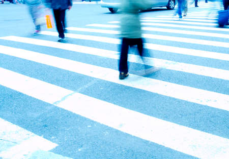 Busy big city street people on zebra crossingの写真素材