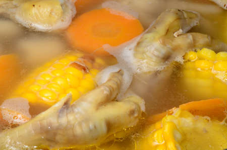 chinese food soup of corn and chicken toeの写真素材