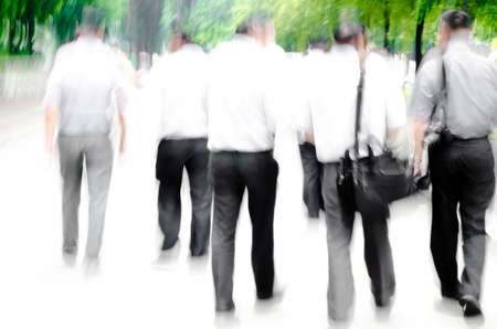 walking business people abstract background blur motionの写真素材