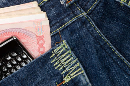cell phone and chinese RMB cash jeans texture background